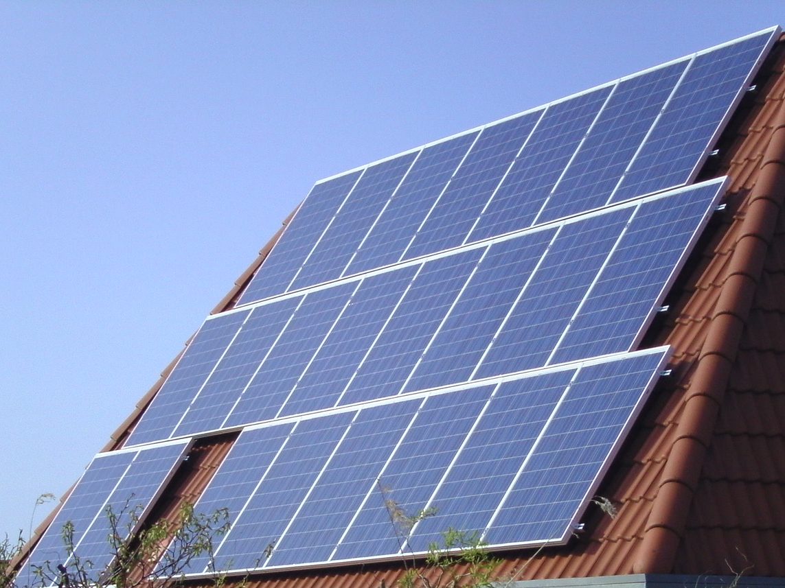Solar modules on a pitched roof.