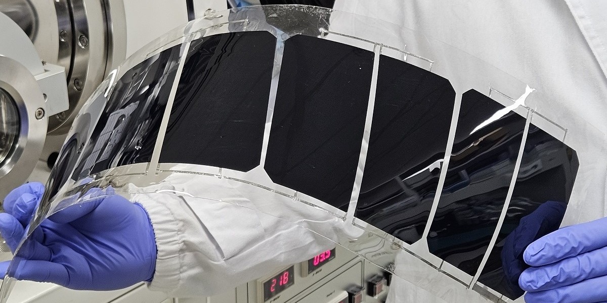 Aluminum-doped zinc oxide glass coating for shielded space solar PV modules