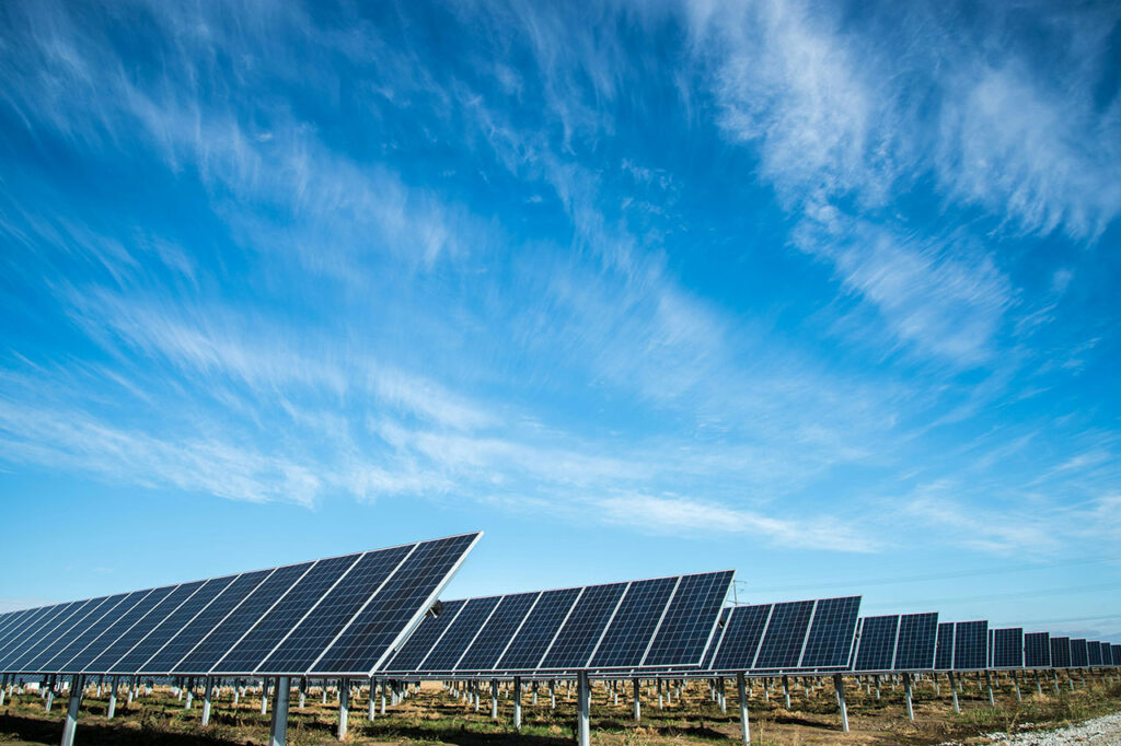 Rows of solar panels and blue sky