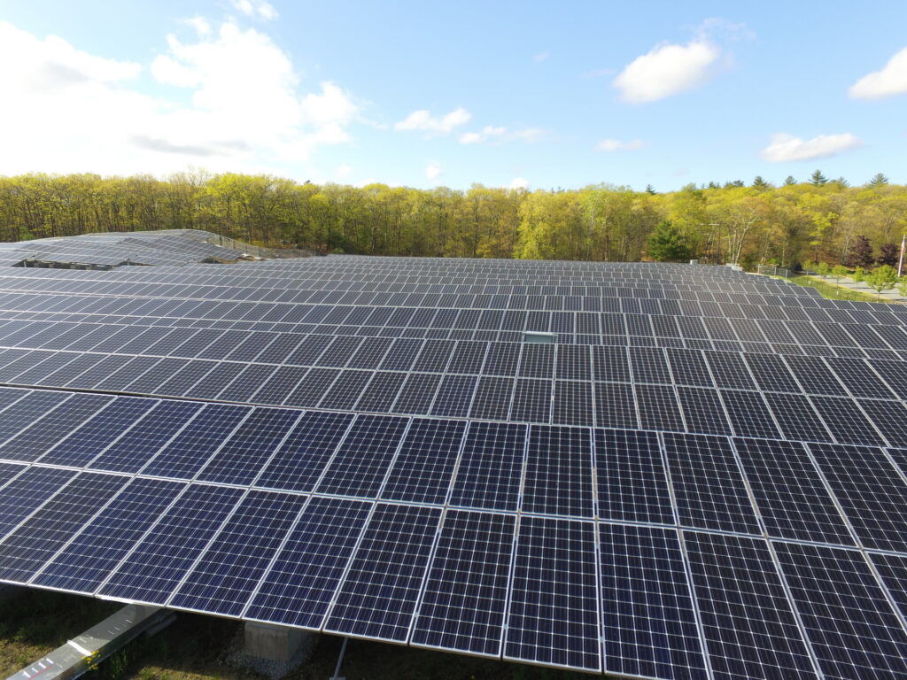 A large solar array featuring older monocrystalline modules